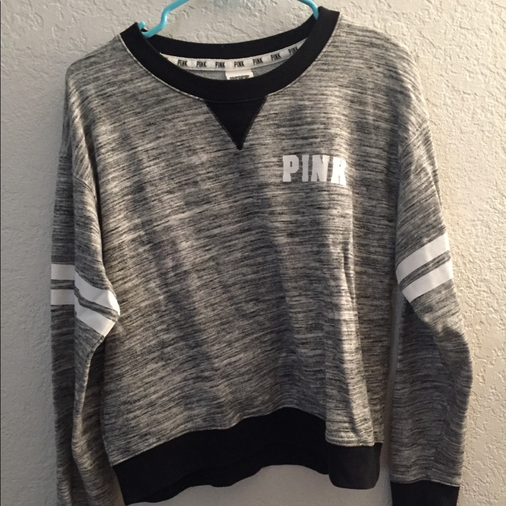 Grey sweatshirt from pink.